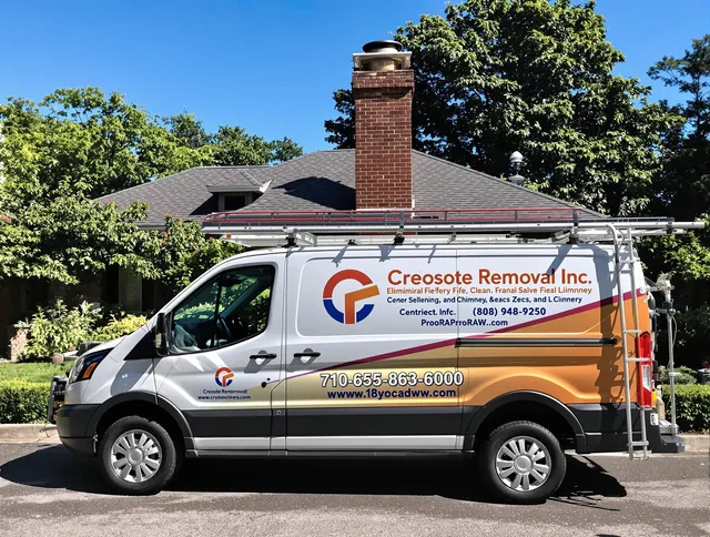Glastonbury Chimney Sweep technician removing creosote safely in Glastonbury, CT